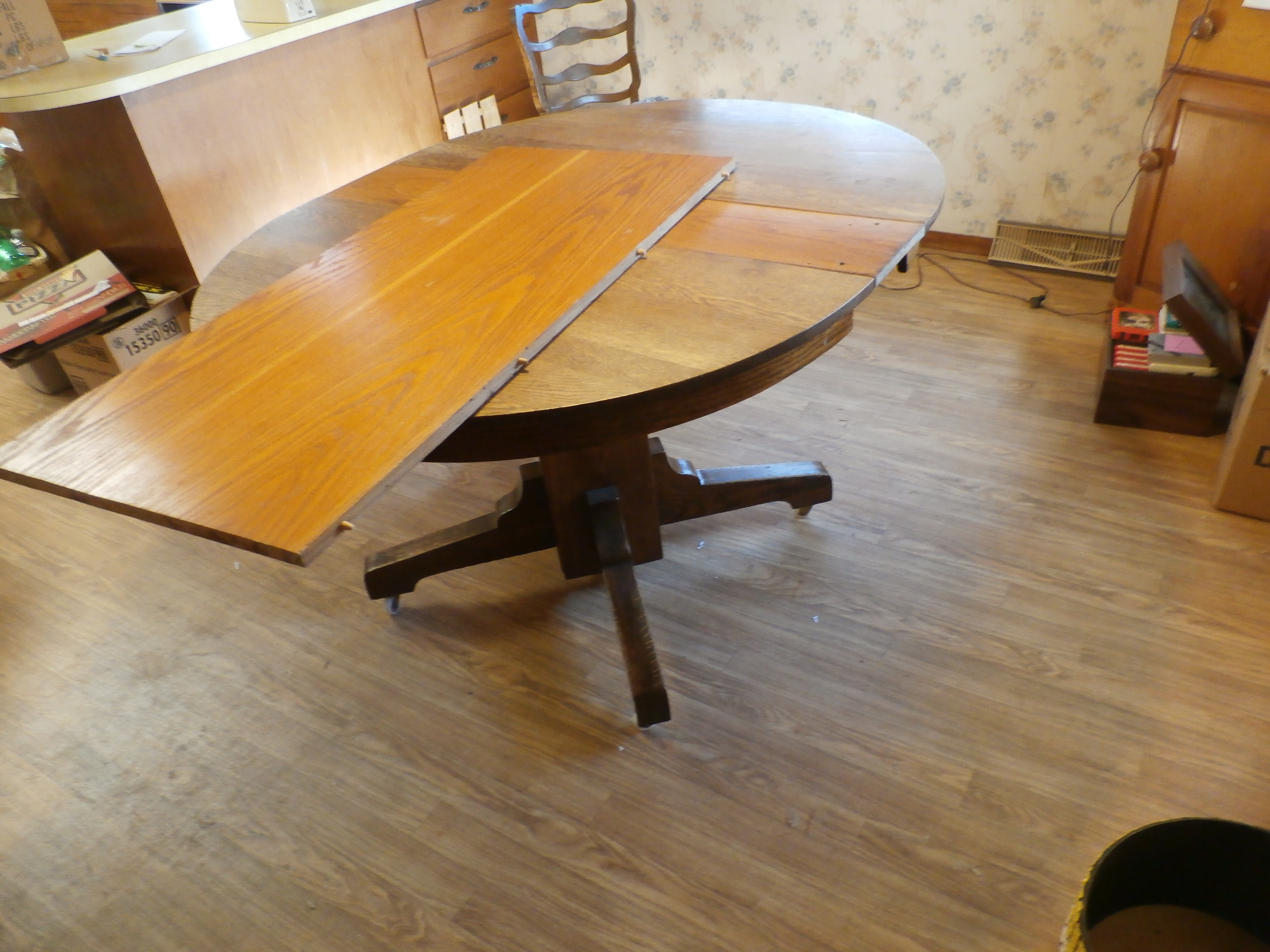 nice old Round Table with non matching leaves.