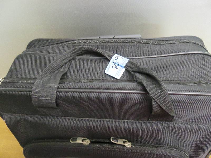 lot 259 image: Small Black Carry On with Wheels