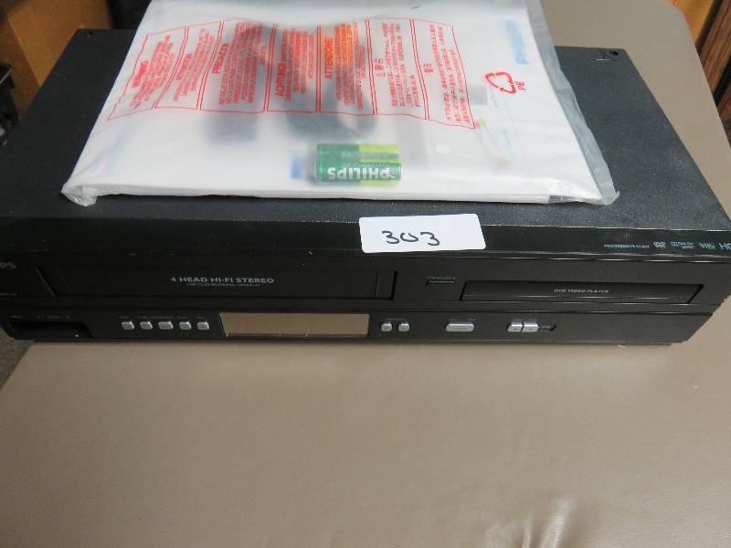 lot 303 image: Phillips VCRDVD Player