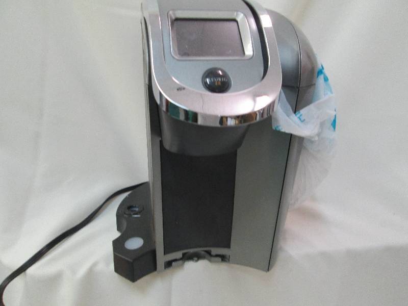 Keurig machine, sold as pictured...