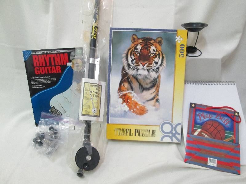 Puzzle, guitar book, gift bag and i...