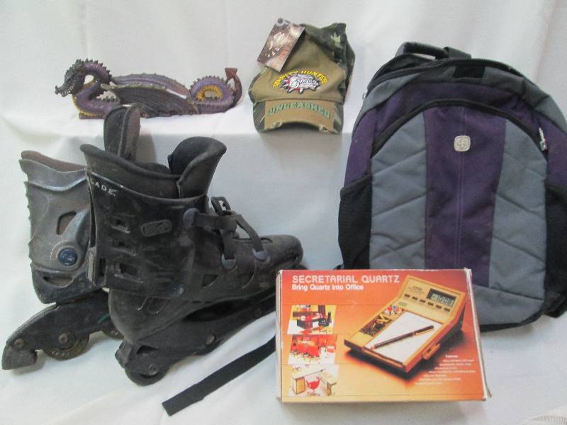 Roller blades, dragon figure, note ...