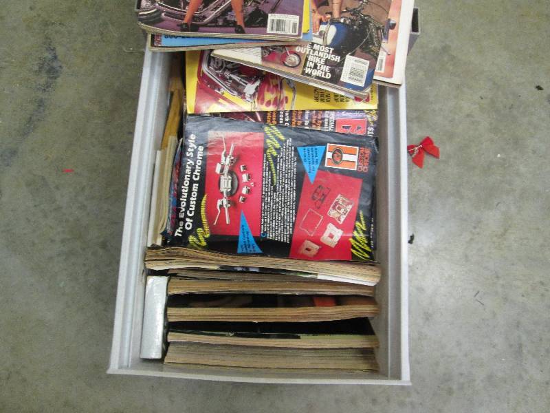 Lot of automotive catalogs and maga...