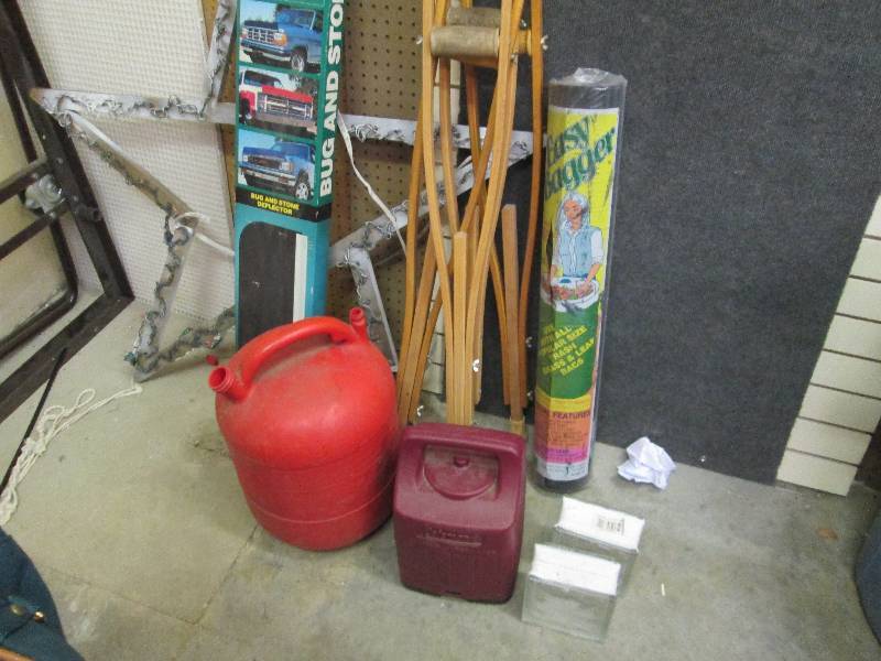 Crutches, gas can, wood lighted sta...
