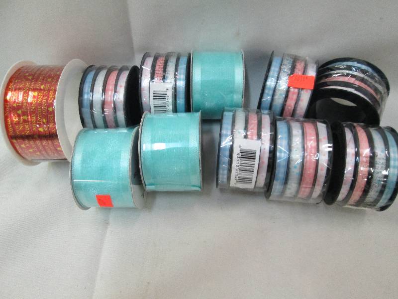 14 new rolls of gift wrapping ribbo...
