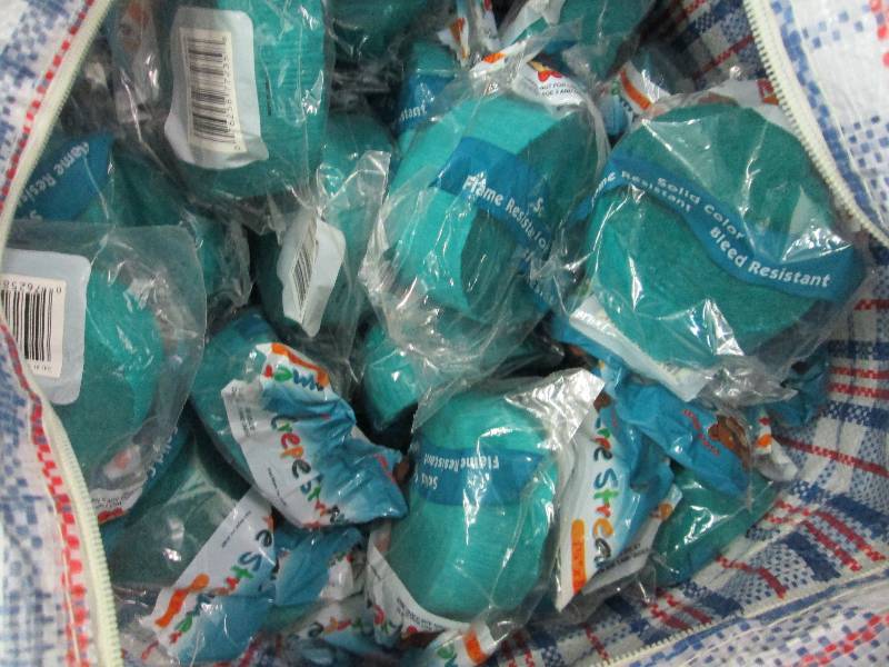 Large tote filled with new rolls of...