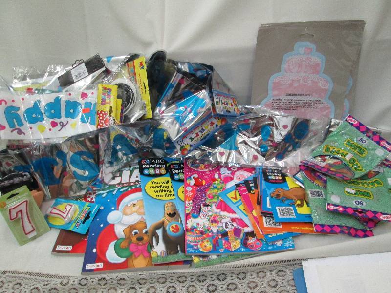 Party supplies including banners, b...