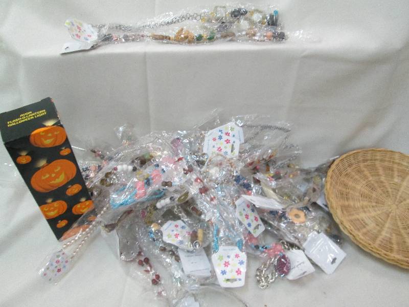 Large lot new in pkg costume jewelr...