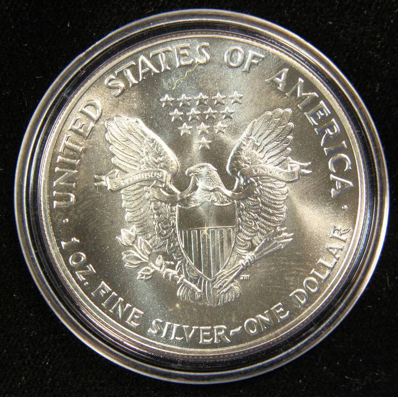 1987 AMERICAN SILVER EAGLE 1 TROY OZ. .999 FINE SILVER DOLLAR IN AIRTITE CAPSULE