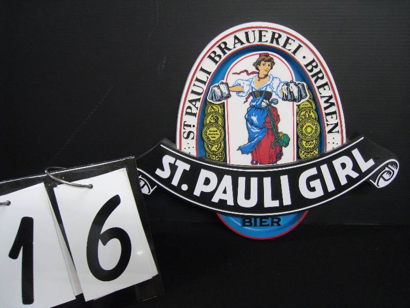 lot 16 image: St Pauli Girl - plastic wall hanger