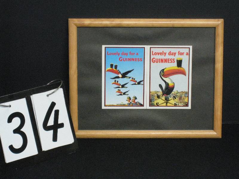 lot 34 image: Framed Guinness prints Its a Lovely Day for a Guinness