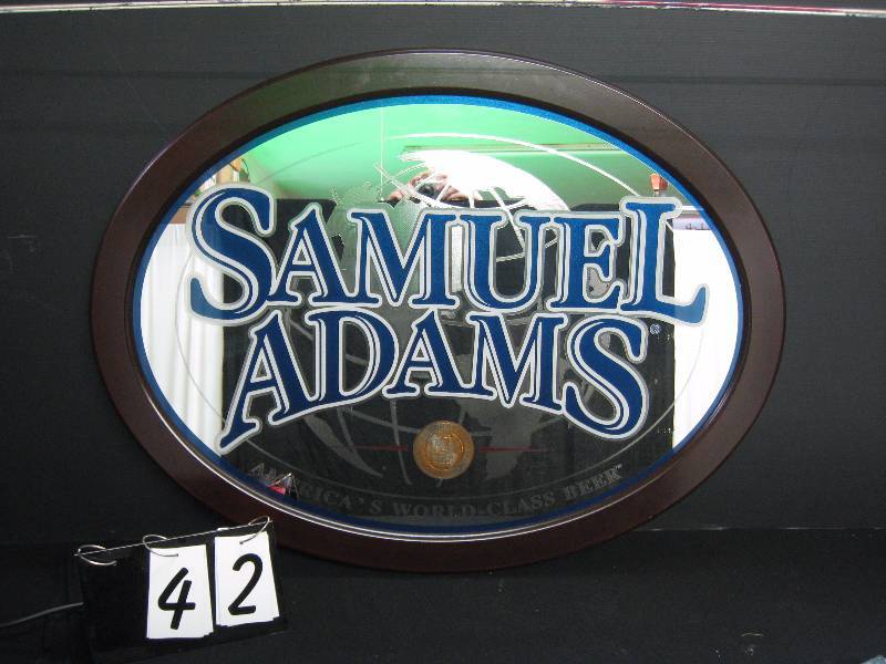 lot 42 image: Sam Adams large mirror, nice wooden frame