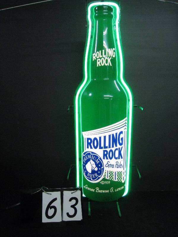 lot 63 image: Rolling Rock bottle outlined with neon