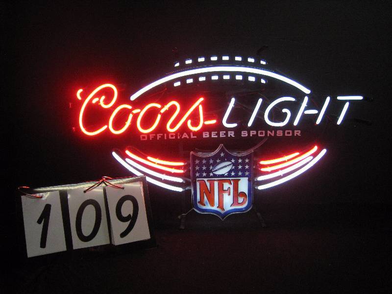 lot 109 image: Coors Light football shape NFL sign, new