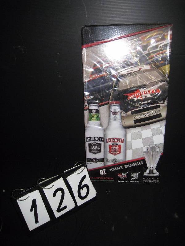 lot 126 image: Smirnoff Kurt Busch NASCAR metal sign NOS, with protective plastic film intact
