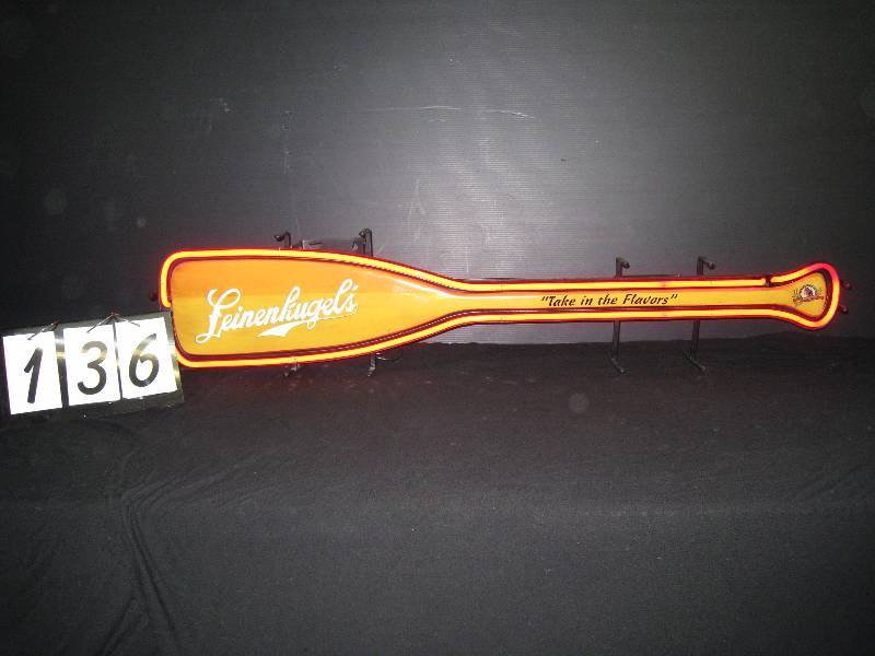 lot 136 image: Leinenkugels canoe paddle with neon border, backlit logo letters