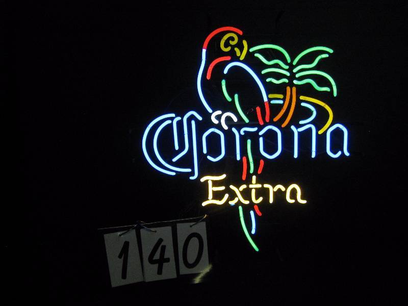 lot 140 image: Corona parrot with palm tree neon - beautiful colors, very popular sign