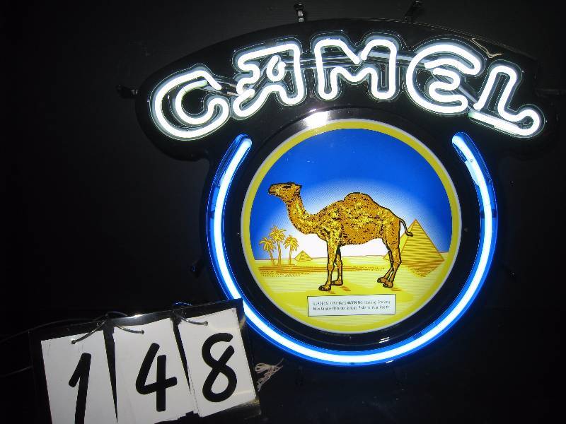 lot 148 image: Camel cigarettes with backlit center, looks new