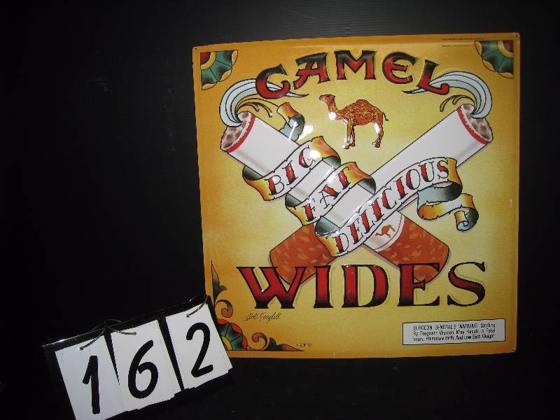 lot 162 image: Camel Wides embossed tin tacker with Scott Campbell (the originator of the the style Ed Hardy made popular) artwork. New, unused