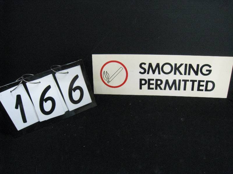 lot 166 image: Smoking Permitted plastic silk-screened sign