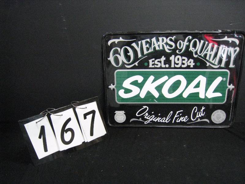 lot 167 image: Skoal embossed tin sign, nice condition