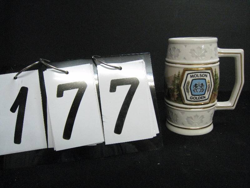 lot 177 image: Worlds Great Breweries 1988 - Molson Golden tankard, Mint condition with Certificate of Authenticity