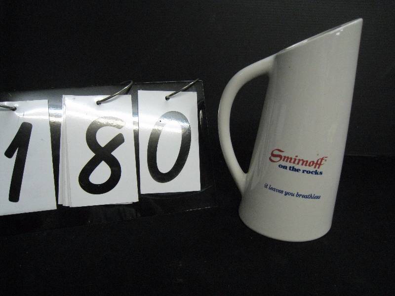 lot 180 image: Smirnoff pitcher - has exterior hairline crack