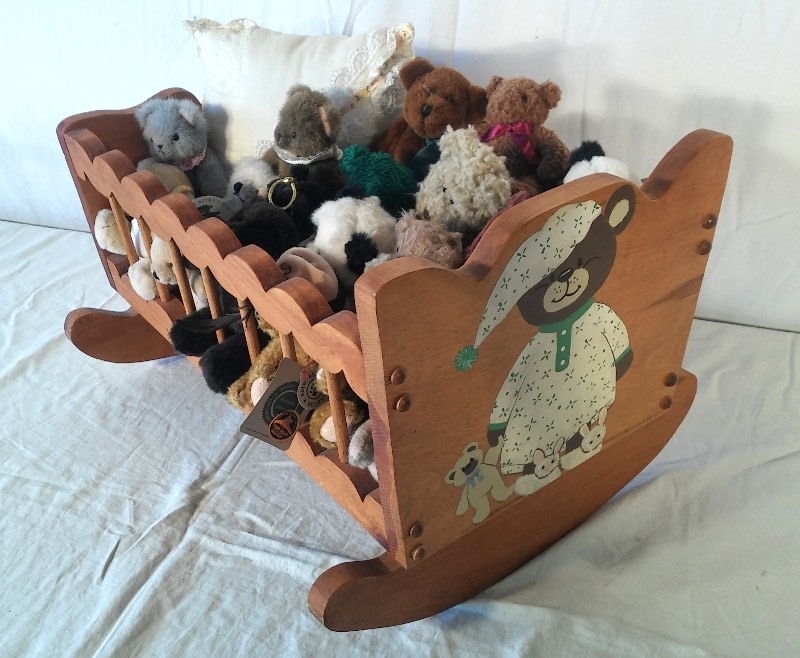 Collection Of Small Bears In A Wooden Painted Cradle
