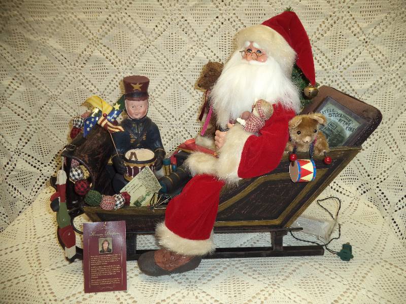 lot 5 image: Karen Didion Original Lighted Vintage Santa in Sled