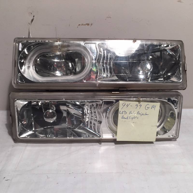 lot 16 image: GM HEADLIGHT ASSEMBLIES