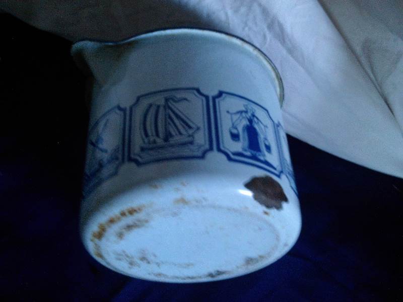 vintage metal pitcher
