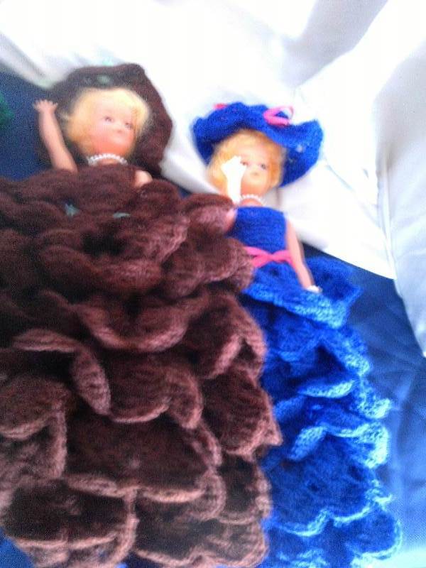 3 barbies with handcrafted dresses