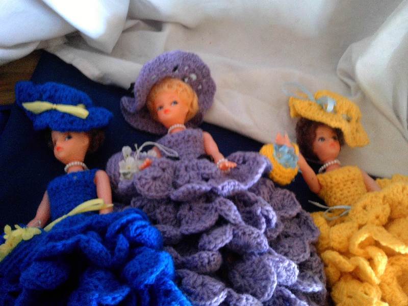 3 barbies with hand crafted dresses