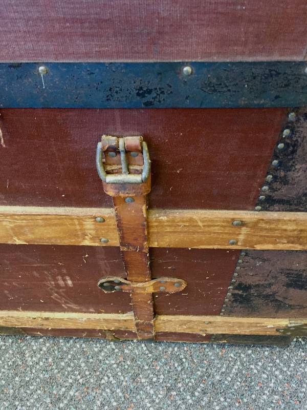 Unusually large trunk antique with the original owners name on tag