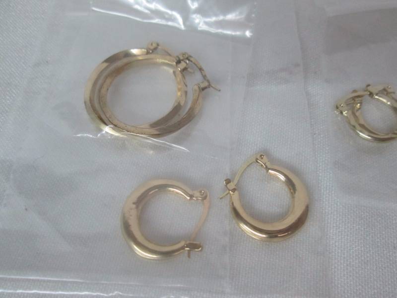 lot 70 image: 10 Pair Goldtone Hoop Earrings Set