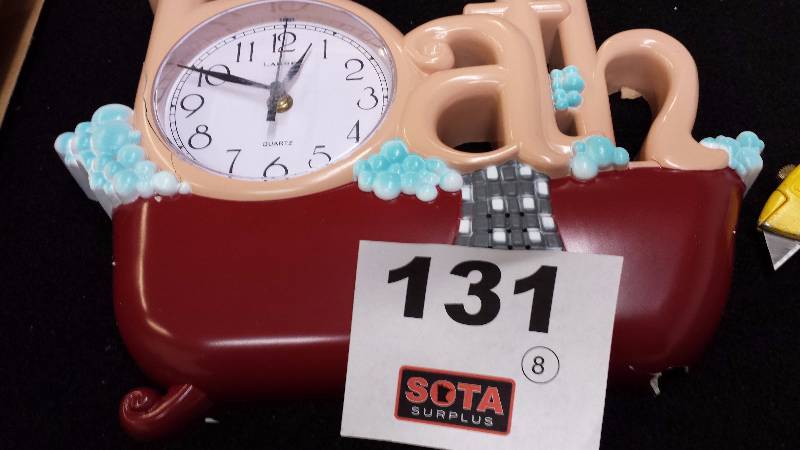 lot 131 image: The Bath Clock with 4 shells Burgundy