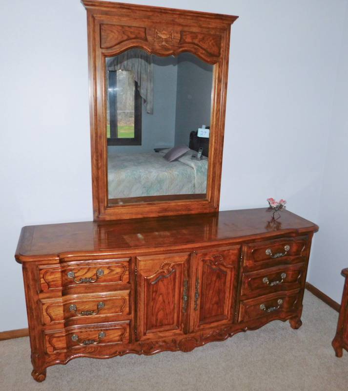 lot 27 image: high end 9 drawer dresser and mirror very light use in guest room