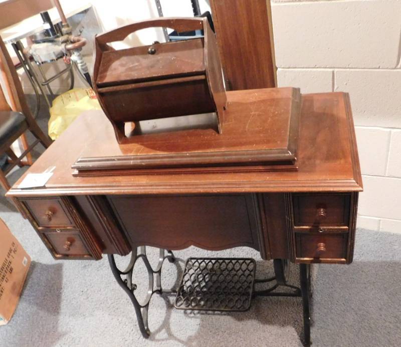 lot 187 image: Beautiful New Home Art Deco Treadle Sewing Machine In A Beautiful Cabinet