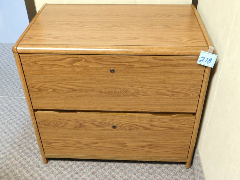 lot 218 image: large wooden file cabinet 2 drawers matches the rest of the set