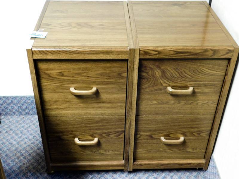 lot 220 image: two side by side wooden file cabinets both have two drawers