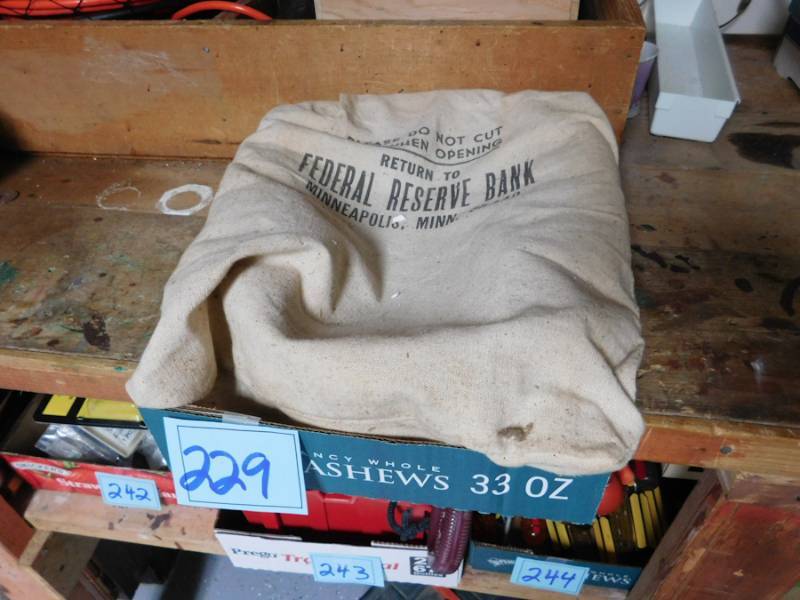lot 229 image: Vintage canvas federal reserve bag with a surprise inside