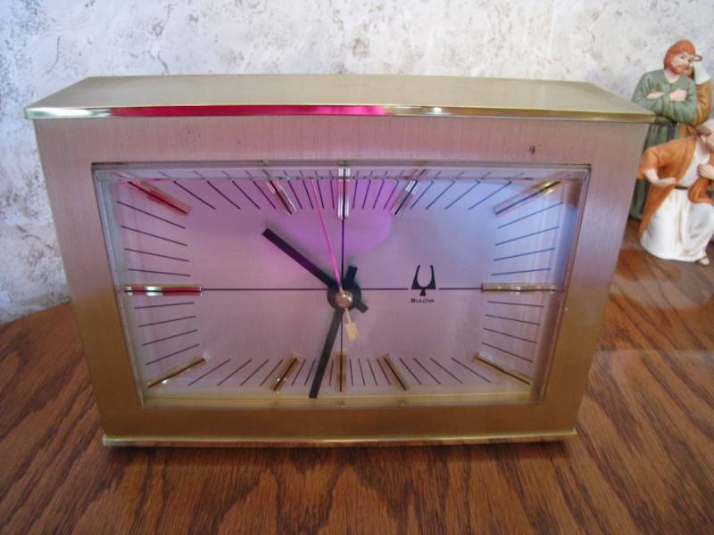 lot 52 image: bulova brass mantleshelf clock