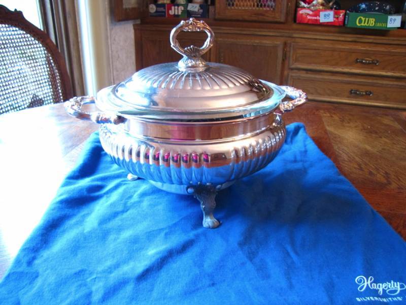 lot 113 image: An electric Sheridan Silver Co. silver plate electric chafing dish.