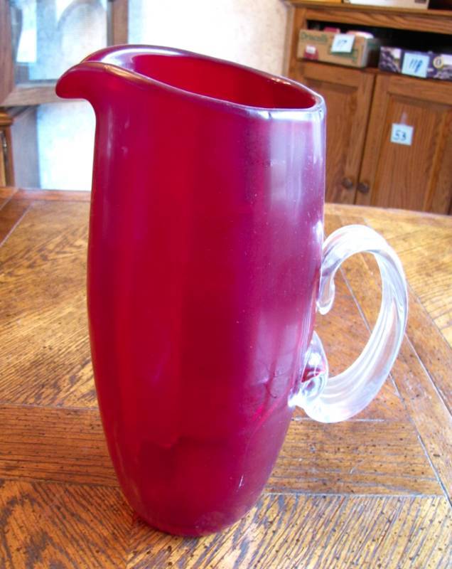 lot 68 image: red glass pitcher