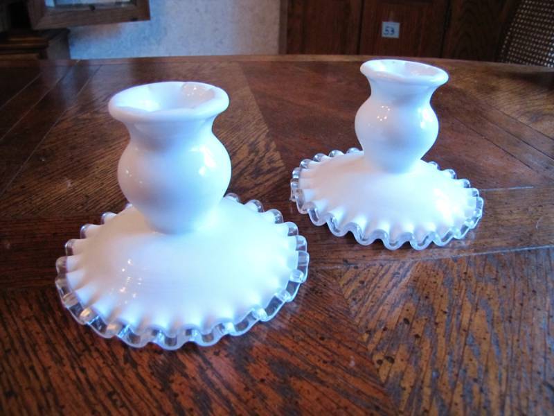 lot 70 image: two Fenton clear and white ruffled candle holders