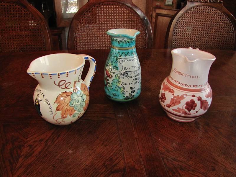 lot 77 image: three ceramic pitchers all look to be European themed