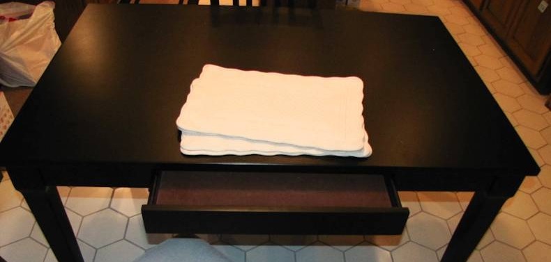 lot 166 image: very nice smaller black dining room table with a drawer