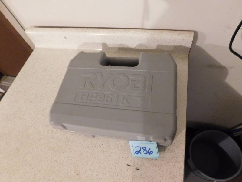 lot 286 image: ryobi drill batteries and charger in the case