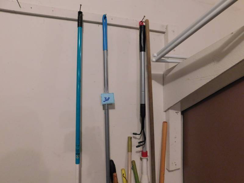 lot 311 image: brooms mops ect long handles