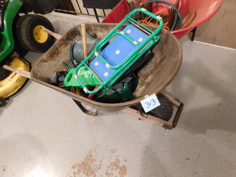 lot 313 image: wheel barrow all the items inside the wheel barrow are included see photos